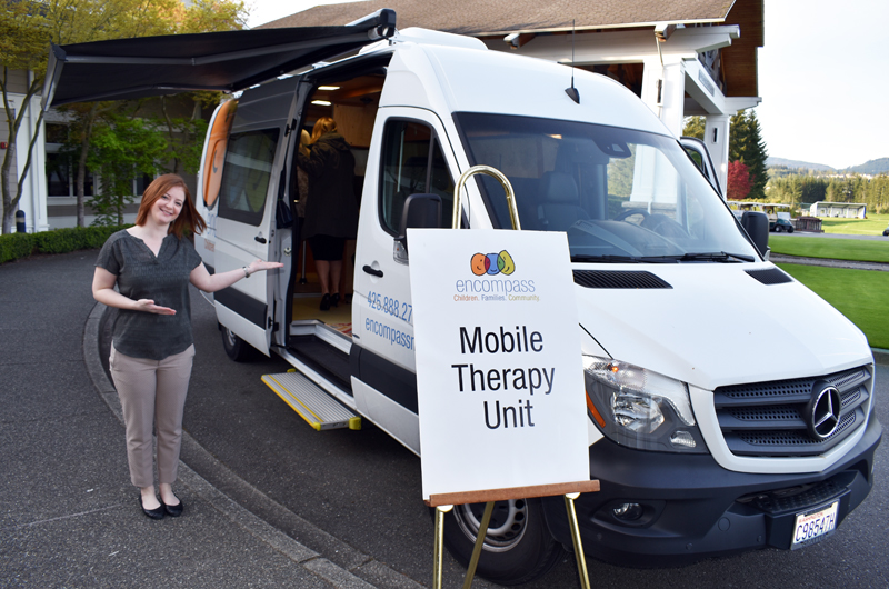 A therapist showing off the Mobile Therapy Unit