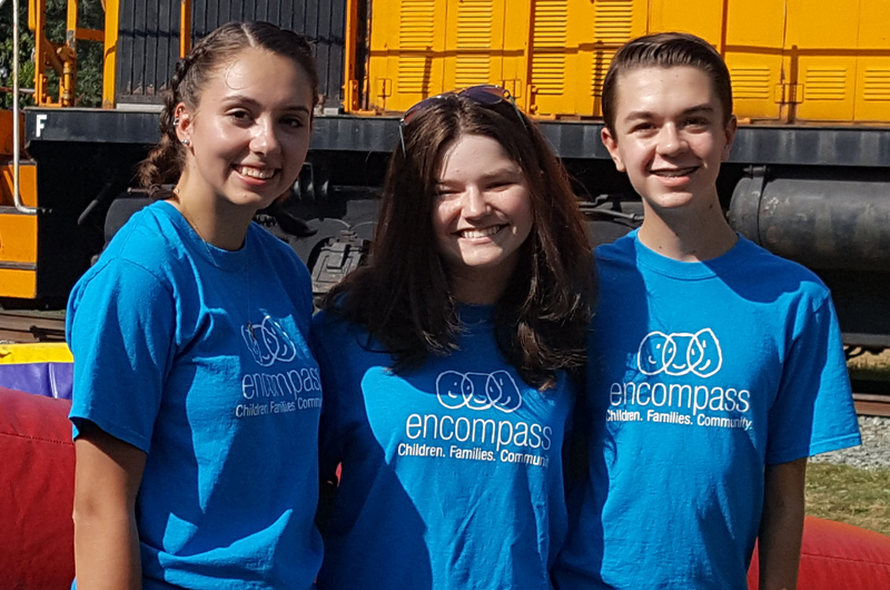 Group of teen volunteers at community event