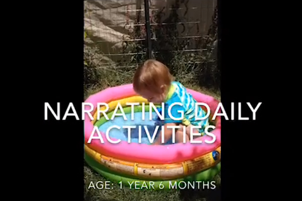 Little girl playing in a kiddie pool