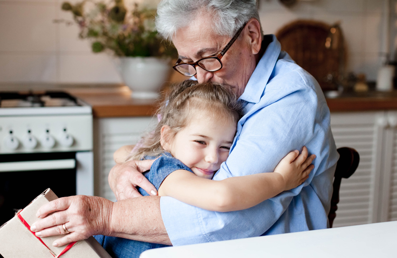 Grandmother and child embrace