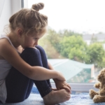 little girl with teddy bear