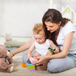 Mom, child, and teddy bear