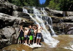 boys and a waterfall