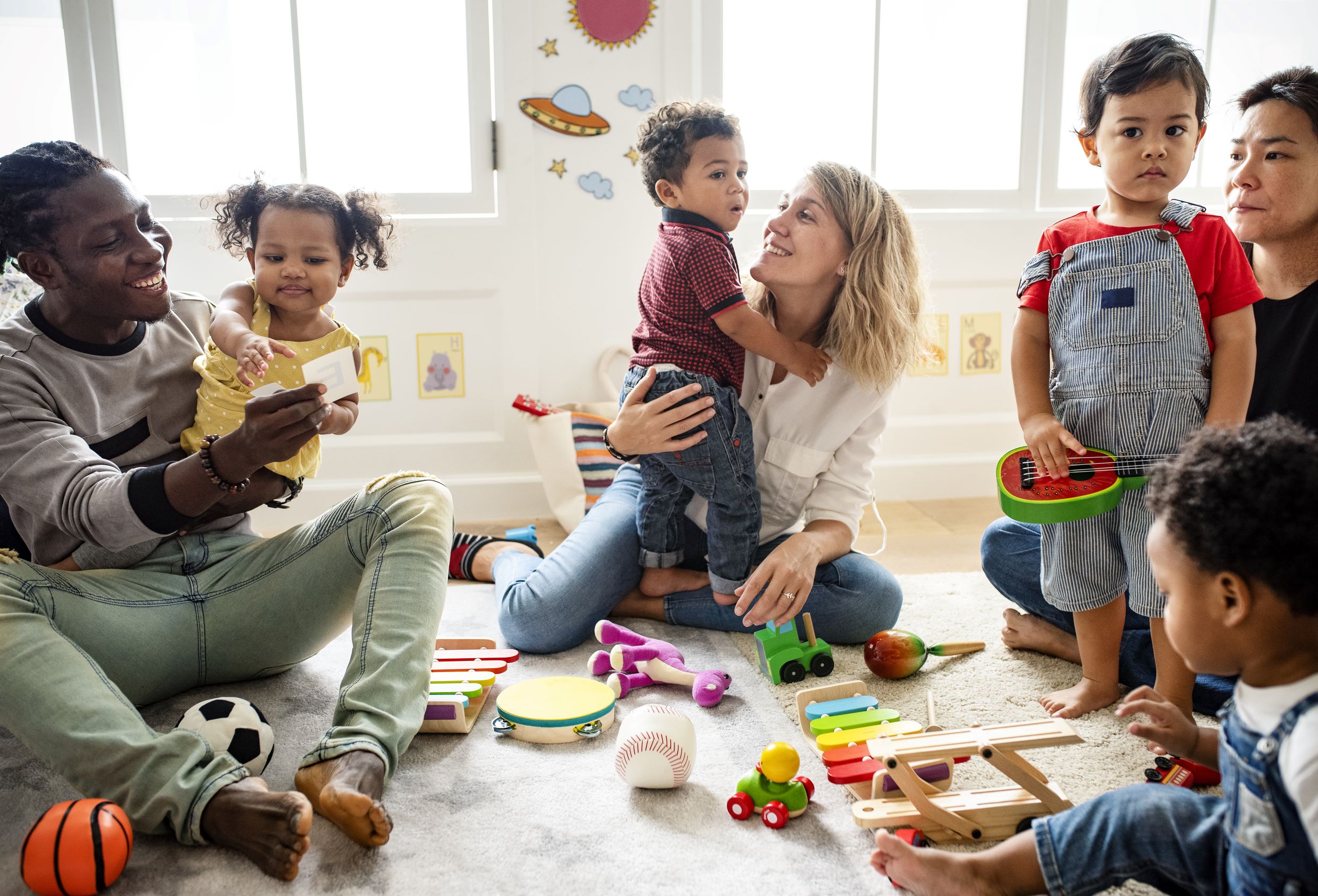 Parents and kids playing